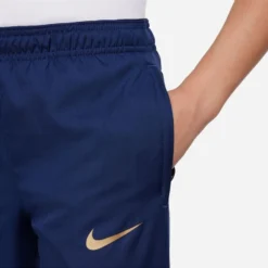 Nike France Tracksuit Dri-FIT Strike Woven 2022/23 - Midnight Navy/Metallic Gold Kids -Track Fit Wear Sales 4ea9d0ca51a6
